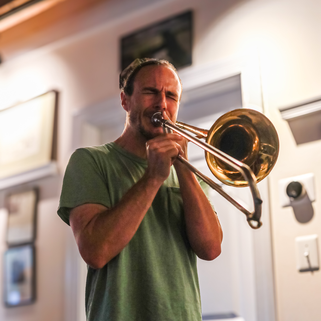 A picture of me playing trombone. Image courtesy of Maria Peña