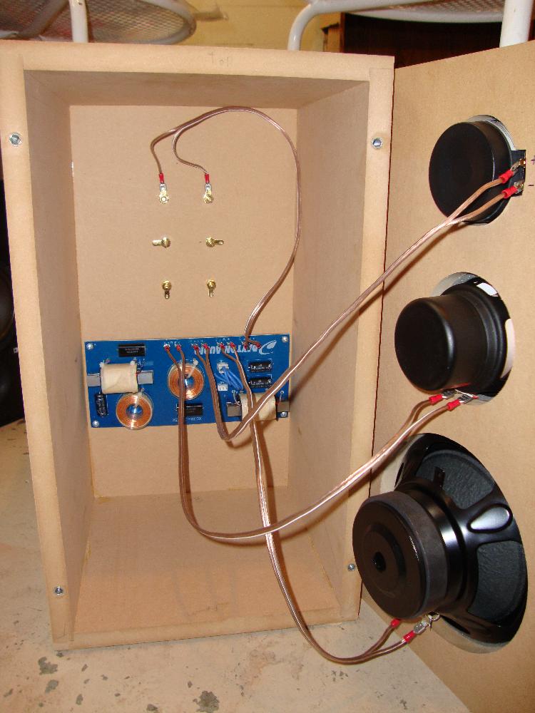 a picture of a stereo speaker. Source https://www.instructables.com/How-Speakers-Work-and-an-Intro-to-Building-a-Subwo/